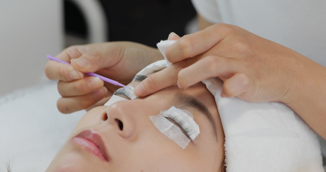 Woman Perm Her Eyelash at Beauty Salon